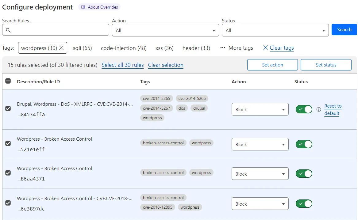 Selecting all rules in a page displays additional drop-down lists above the table to override the behavior of several rules at once.